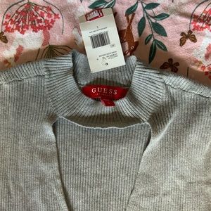 Brand new Guess tank with cutouts on chest!